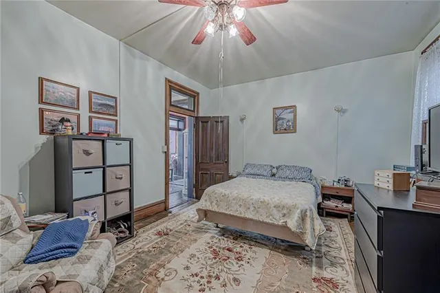 a bed room with bed and window