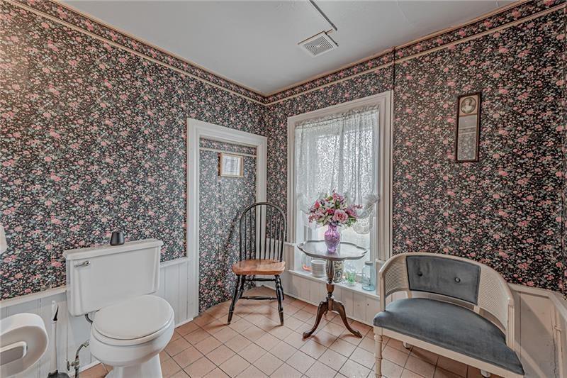 1892 McClellandtown Road Adah, PA 15410 - Photo 15 of 33 a bathroom with a toilet a sink and a bathtub
