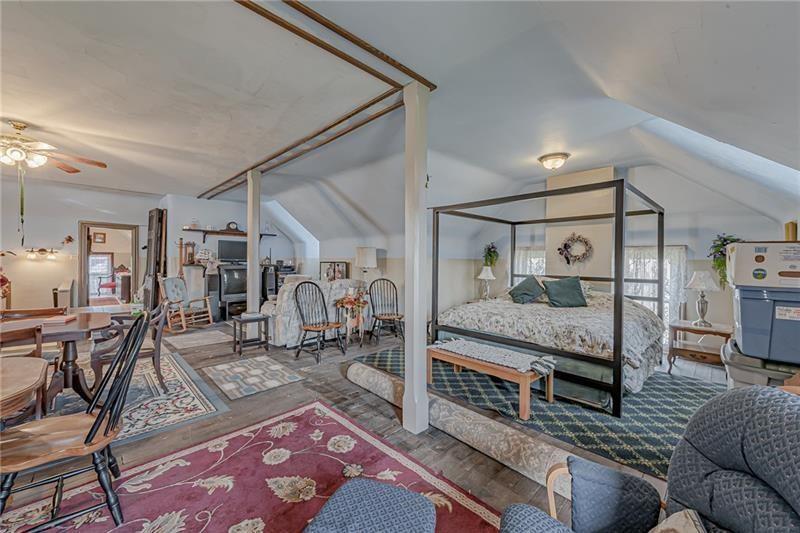 1892 McClellandtown Road Adah, PA 15410 - Photo 21 of 33 a living room with furniture and wooden floor