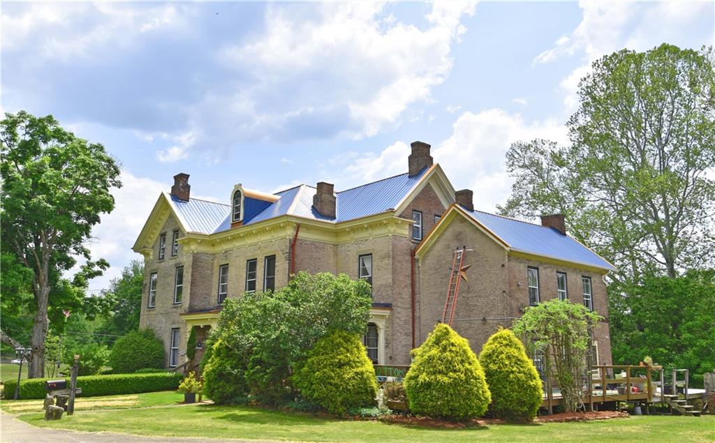 1892 McClellandtown Road Adah, PA 15410 - Photo 25 of 33 a front view of a house with garden