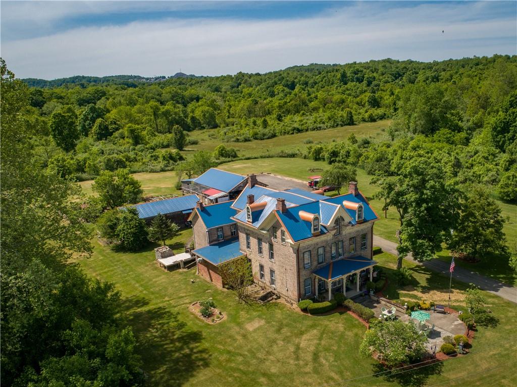 1892 McClellandtown Road Adah, PA 15410 - Photo 33 of 33 an aerial view of a house with garden space and outdoor seating