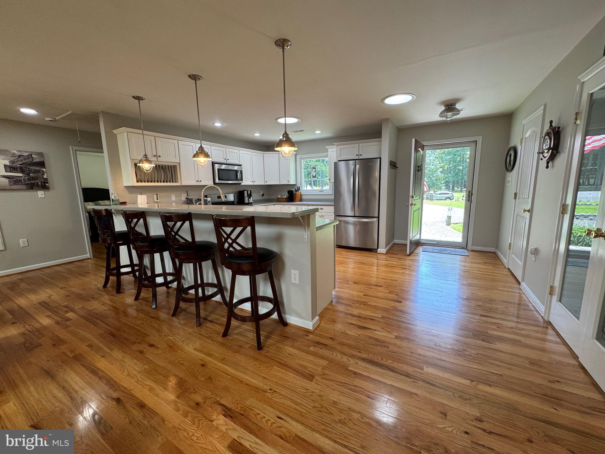 205 Trumps Court Reedville, VA 22539 - Photo 6 of 10 Wood floors, updated kitchen