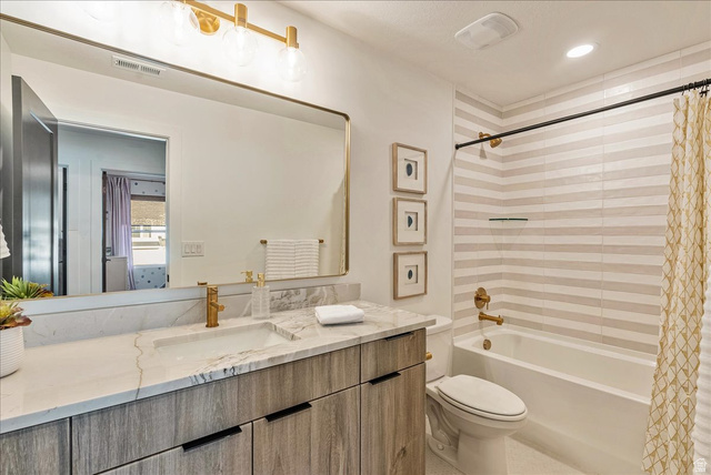 2458 West Aurora Avenue, Unit 287 Mapleton, UT 84664 - Photo 17 of 24 Full bathroom featuring shower / tub combo with curtain and vanity