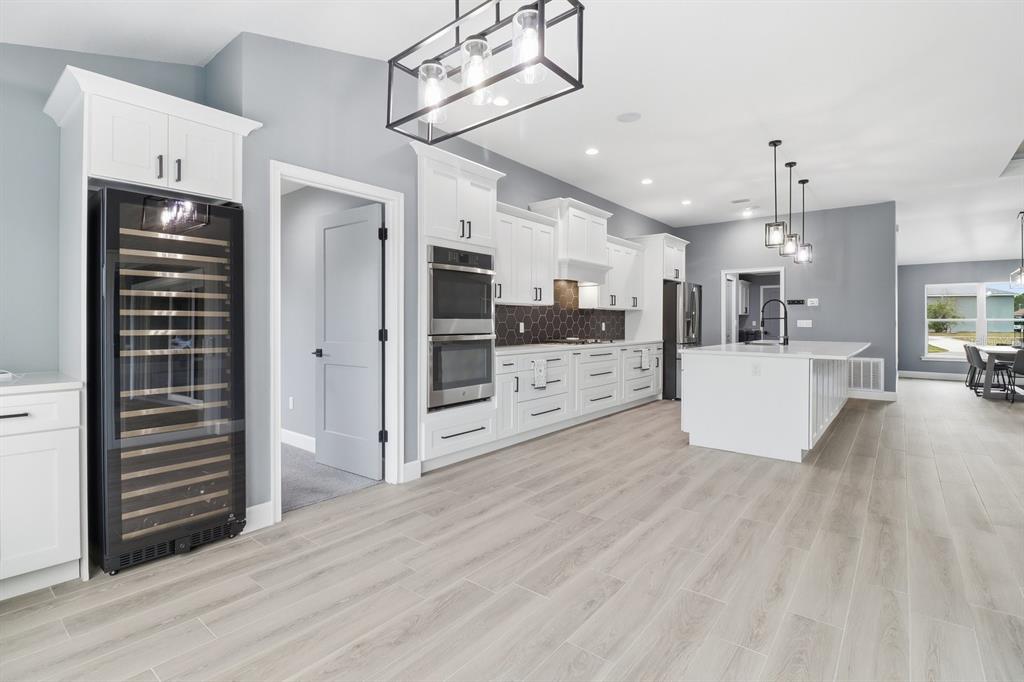 18459 Southwest 66th Loop Dunnellon, FL 34432 - Photo 11 of 41 a view of a kitchen with furniture and wooden floor