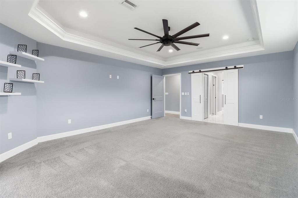 18459 Southwest 66th Loop Dunnellon, FL 34432 - Photo 15 of 41 a view of a livingroom with a ceiling fan and window