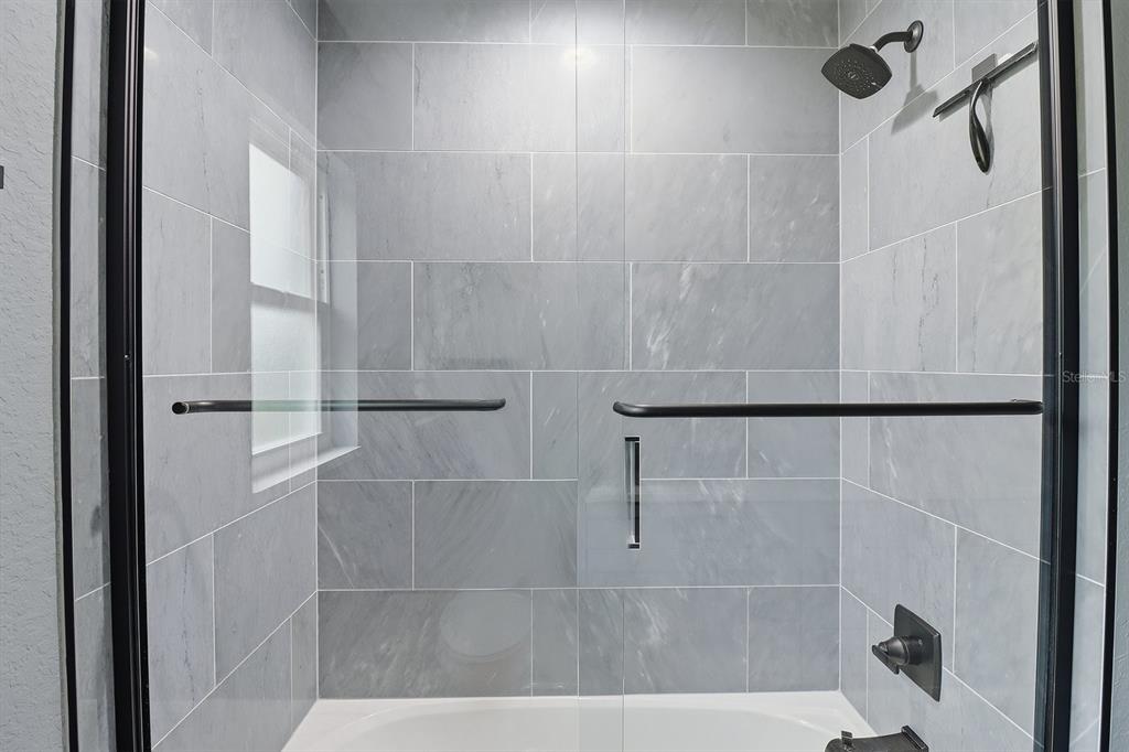 18459 Southwest 66th Loop Dunnellon, FL 34432 - Photo 25 of 41 a bathroom with a shower