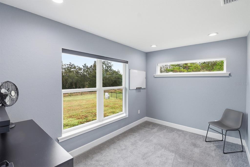 18459 Southwest 66th Loop Dunnellon, FL 34432 - Photo 27 of 41 a view of an empty room with a window