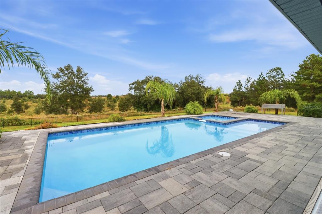 18459 Southwest 66th Loop Dunnellon, FL 34432 - Photo 32 of 41 a view of outdoor space with swimming pool and lake view