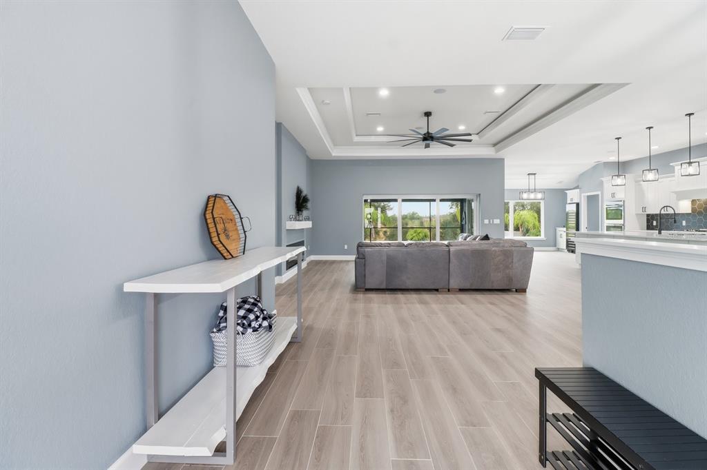 18459 Southwest 66th Loop Dunnellon, FL 34432 - Photo 4 of 41 a living room with furniture and a wooden floor