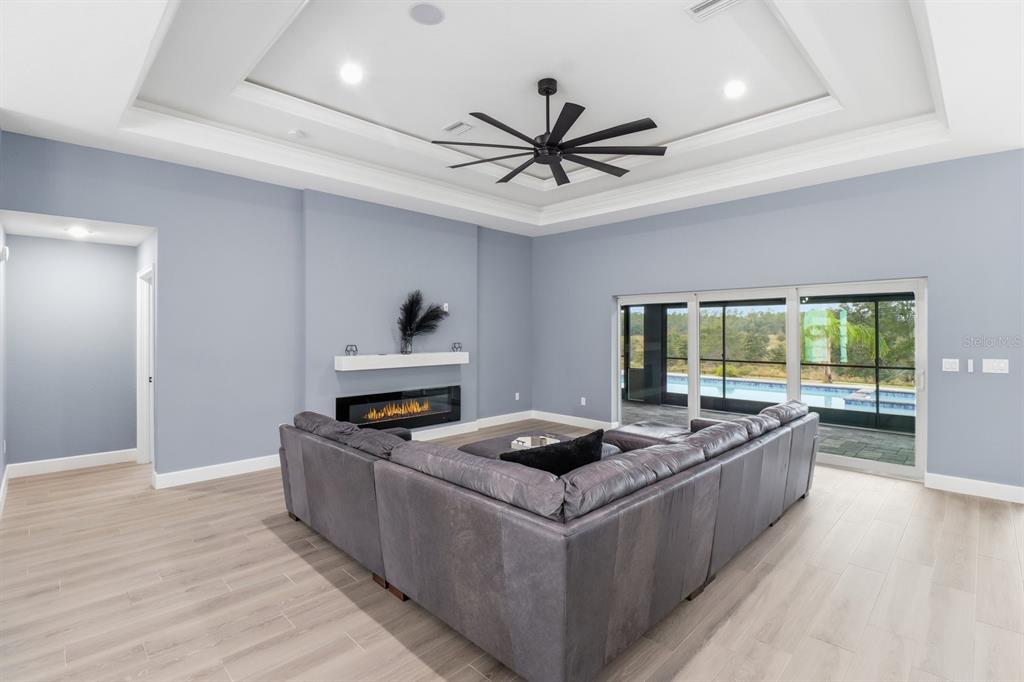 18459 Southwest 66th Loop Dunnellon, FL 34432 - Photo 7 of 41 a kitchen with stainless steel appliances granite countertop a stove and a white cabinets