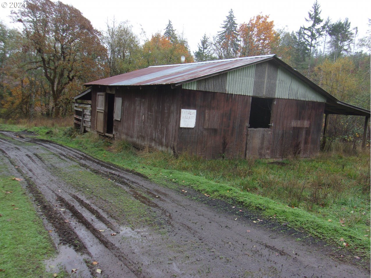 39725 Southwest Fort Hill Road Willamina, OR 97396 - Photo 15 of 16 a backyard of a house with lots of green space
