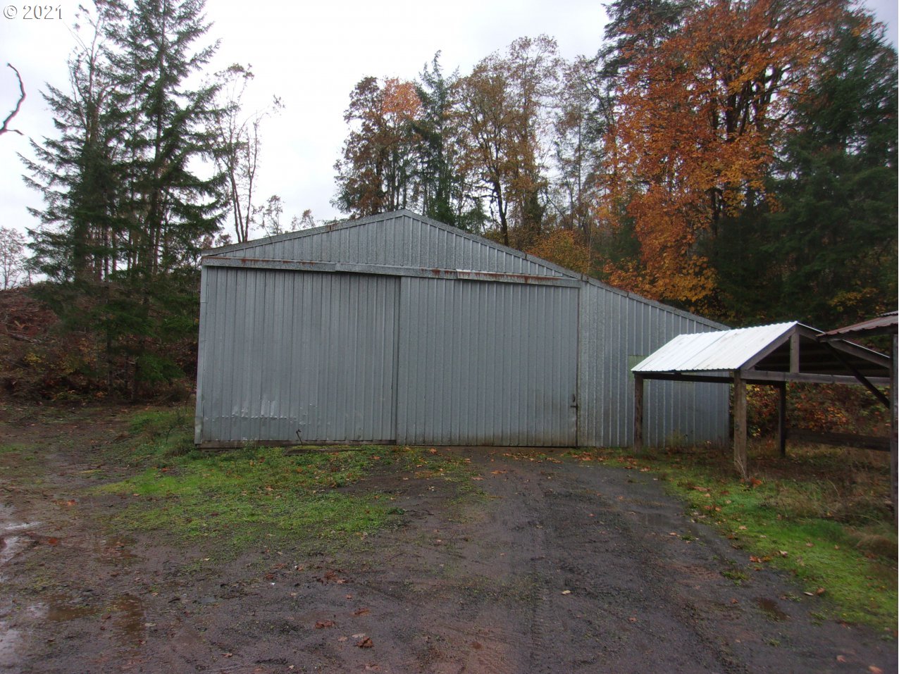 39725 Southwest Fort Hill Road Willamina, OR 97396 - Photo 3 of 16 a backyard of a house with lots of green space