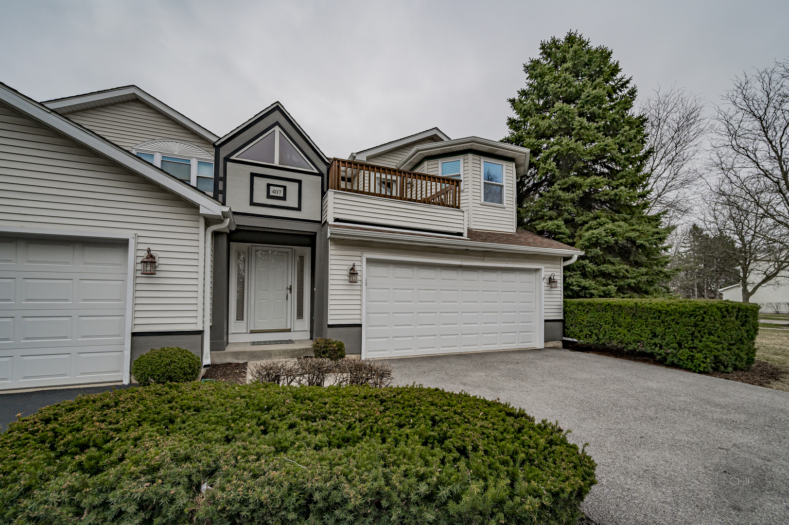 407 Inner Cir Drive Bolingbrook, IL 60490 - Photo 1 of 20 a front view of a house with a yard