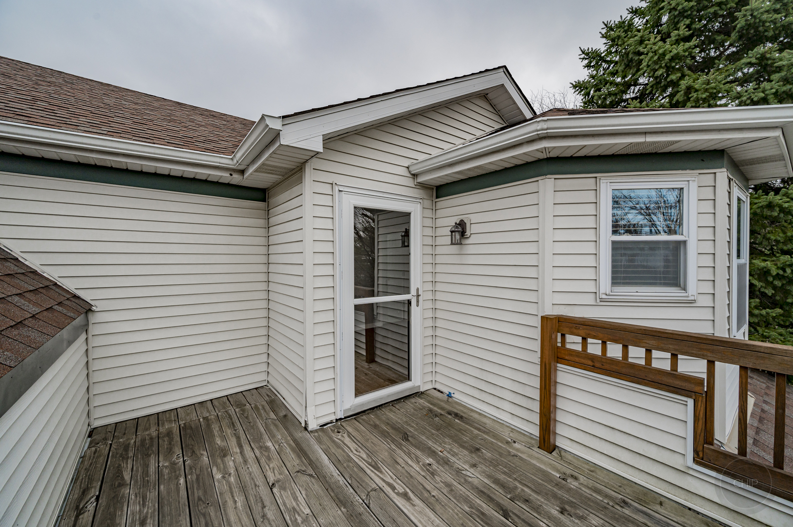 407 Inner Cir Drive Bolingbrook, IL 60490 - Photo 14 of 20 a view of a house with a deck and furniture