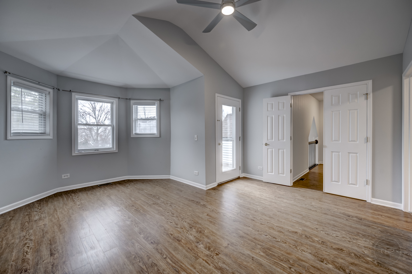 407 Inner Cir Drive Bolingbrook, IL 60490 - Photo 6 of 20 an empty room with wooden floor closet and windows