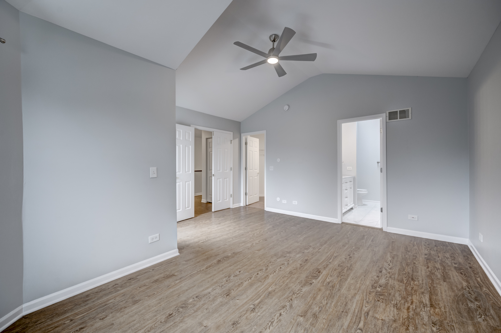 407 Inner Cir Drive Bolingbrook, IL 60490 - Photo 7 of 20 a view of an empty room with wooden floor