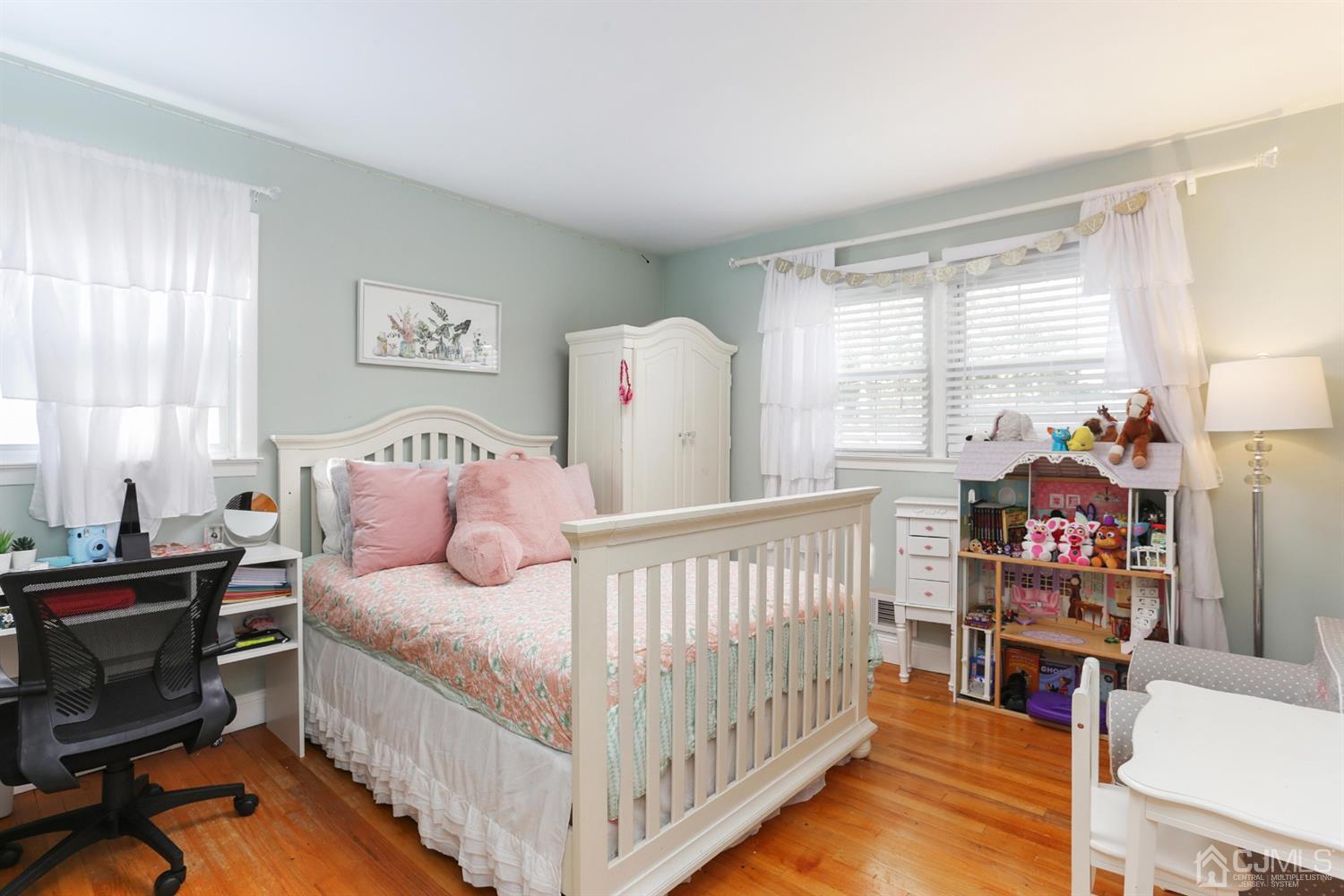 17 Peake Road Edison, NJ 08837 - Photo 12 of 18 a bedroom with a bed and a window
