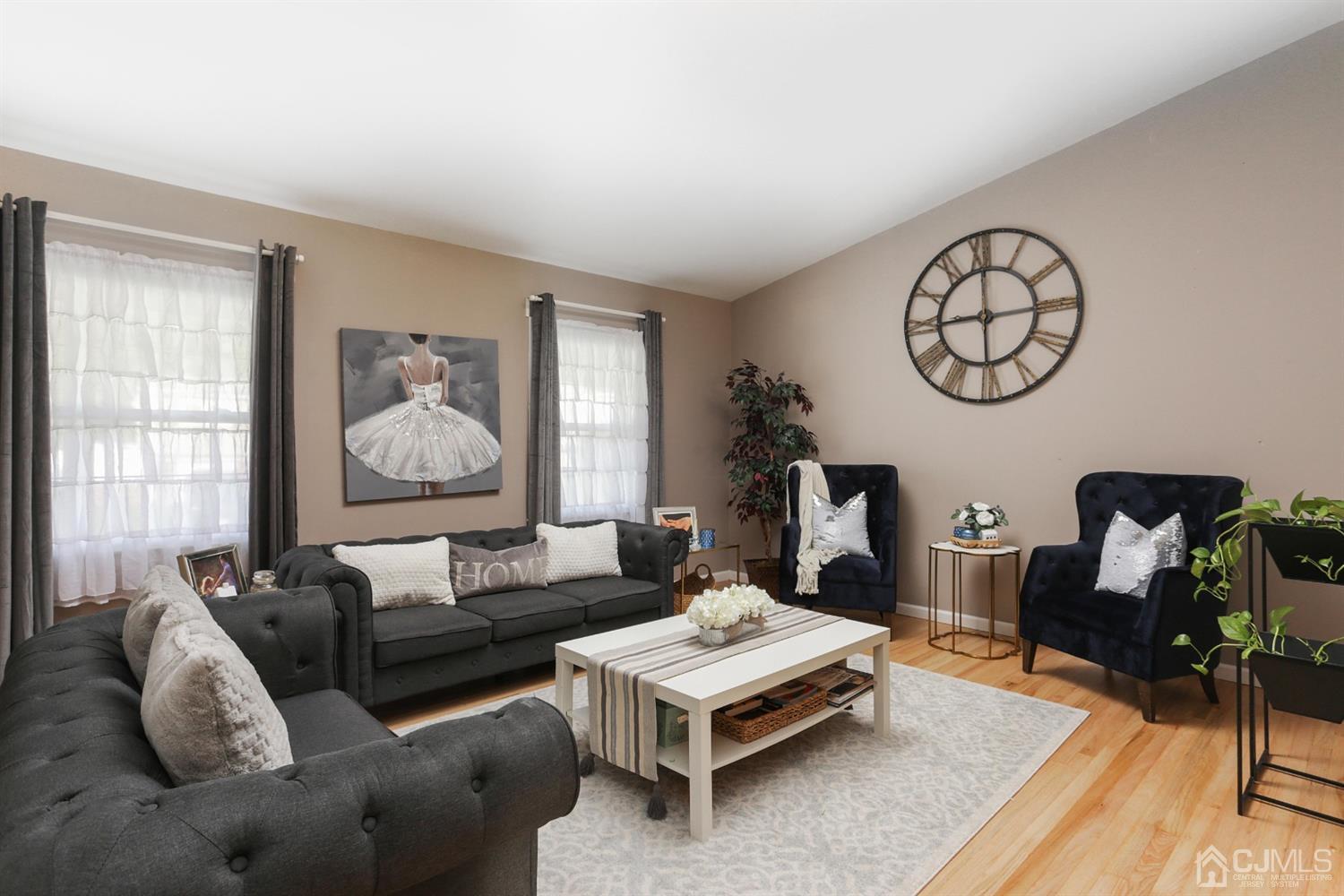17 Peake Road Edison, NJ 08837 - Photo 4 of 18 a living room with furniture a rug and a window