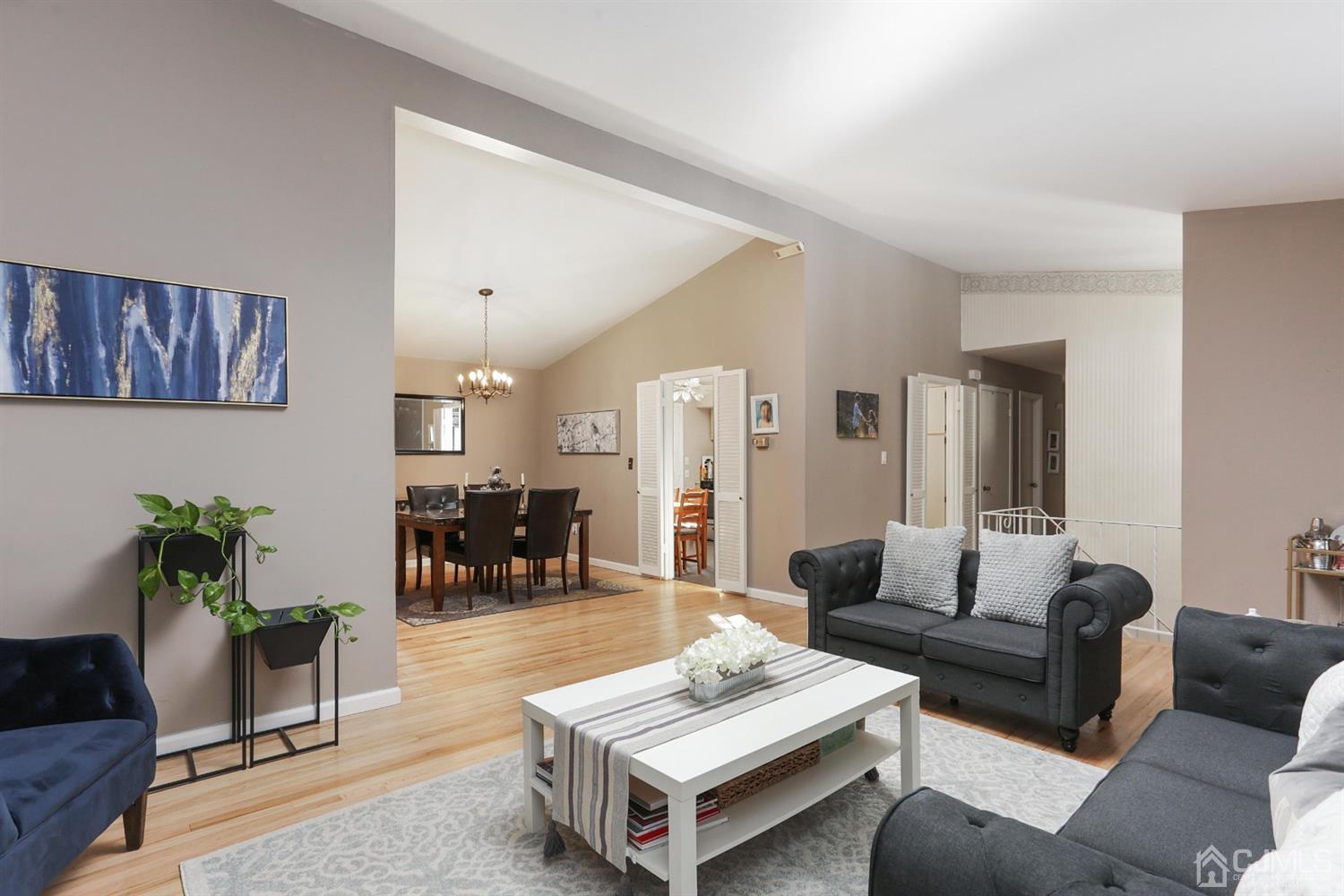 17 Peake Road Edison, NJ 08837 - Photo 5 of 18 a living room with furniture and dining table