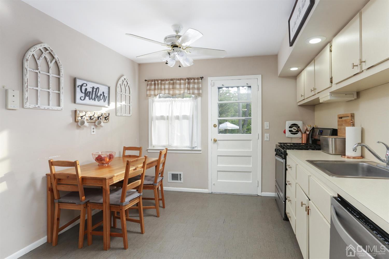 17 Peake Road Edison, NJ 08837 - Photo 8 of 18 a view of a dining room with furniture and chandelier