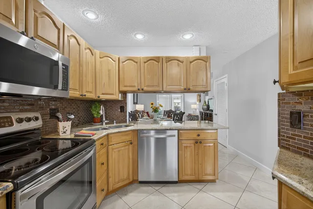 a bedroom with a bed and a table