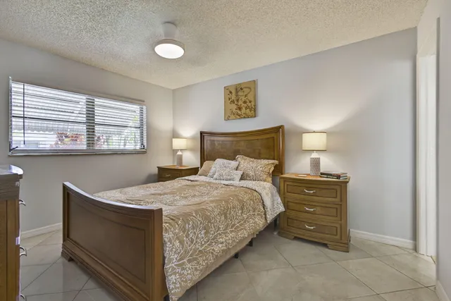 a bedroom with a bed and furniture