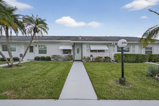 a front view of house with yard