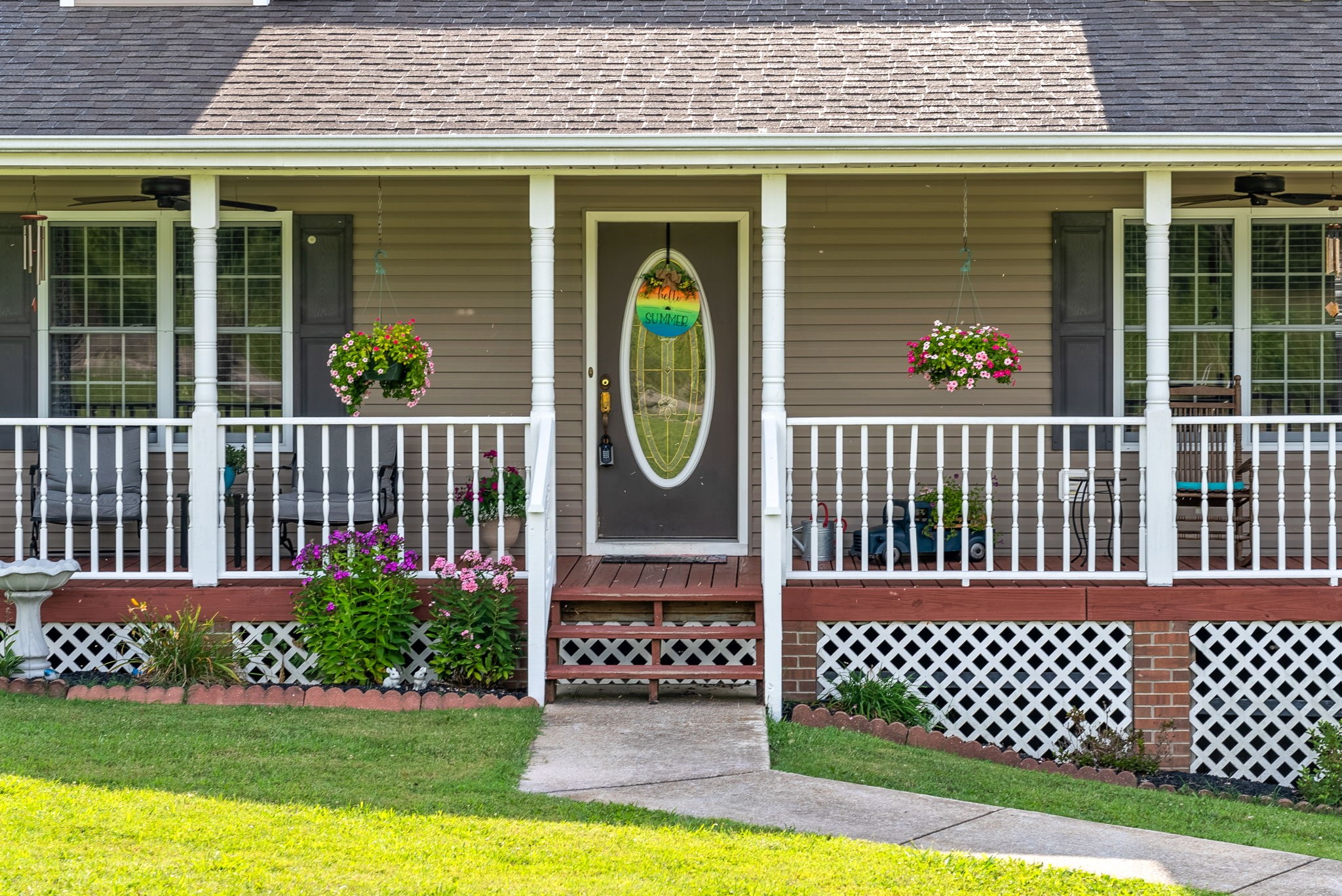 265 Sara Drive Tennessee Ridge, TN 37178 - Photo 5 of 39 a view of a house with a small yard and a large window