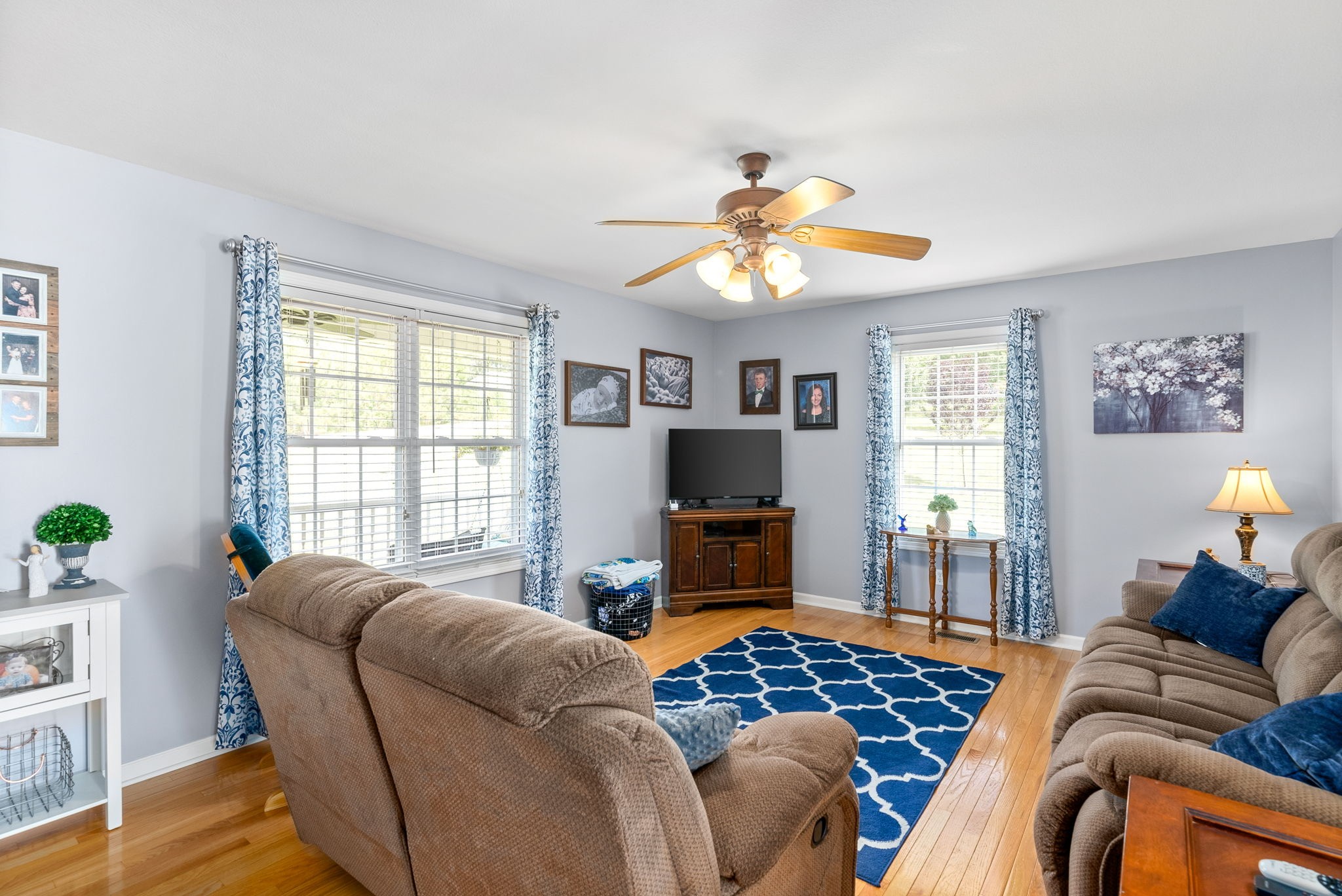 265 Sara Drive Tennessee Ridge, TN 37178 - Photo 9 of 39 a living room with furniture and a flat screen tv
