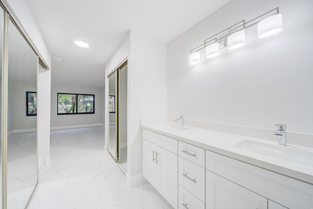 8067 Summerbreeze Lane Boca Raton, FL 33496 - Photo 15 of 29 a bathroom with a shower