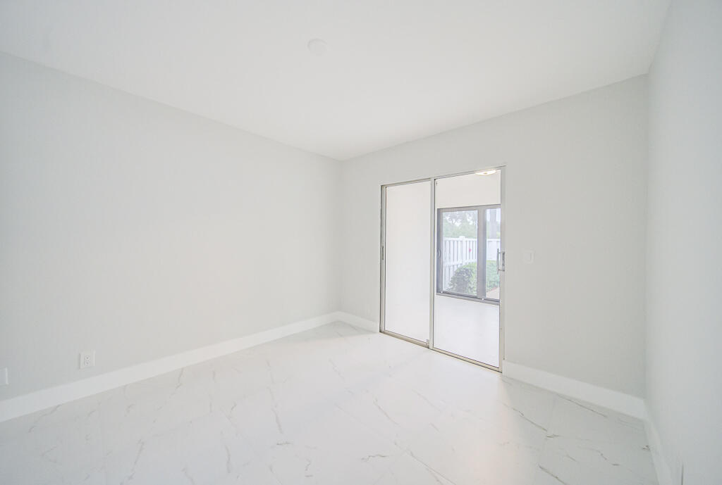 8067 Summerbreeze Lane Boca Raton, FL 33496 - Photo 17 of 29 a view of an empty room
