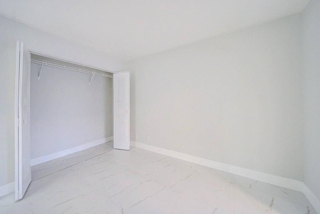 8067 Summerbreeze Lane Boca Raton, FL 33496 - Photo 18 of 29 a view of an empty room