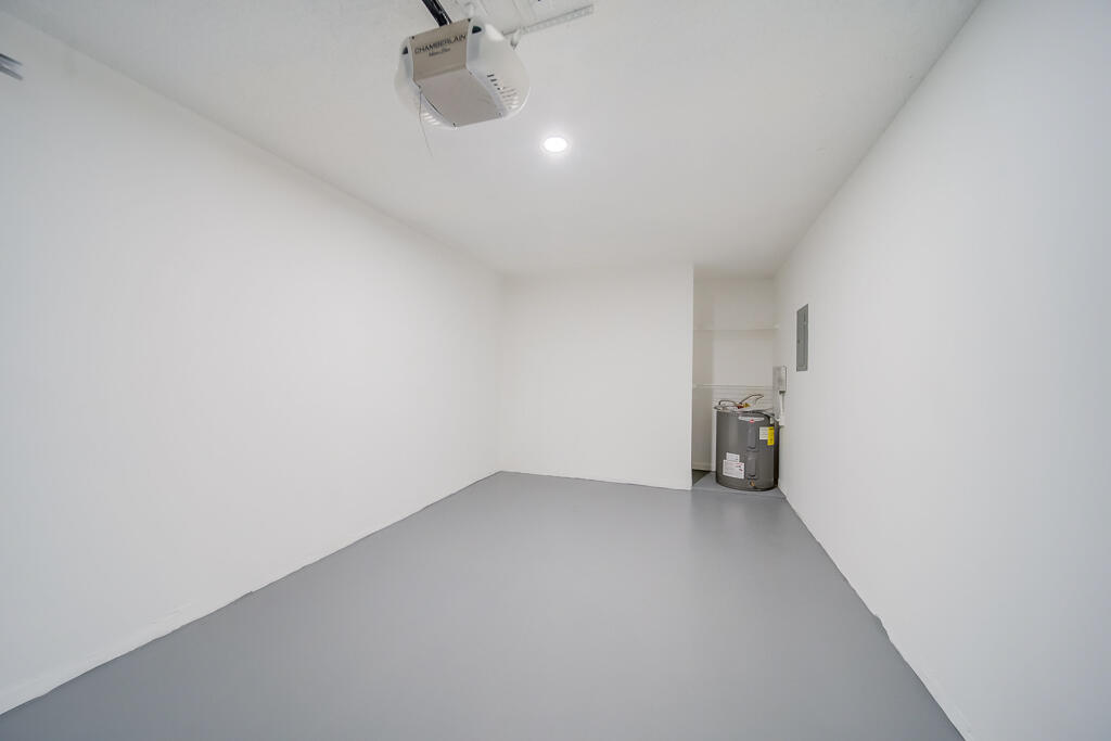 8067 Summerbreeze Lane Boca Raton, FL 33496 - Photo 22 of 29 a view of a room with a utility room