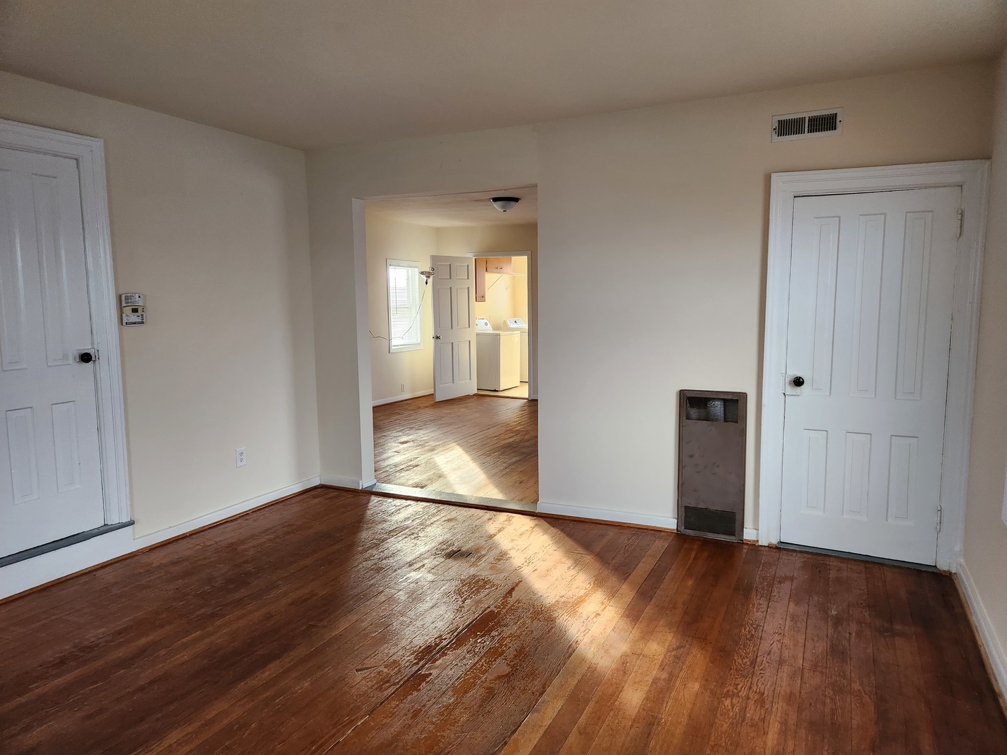 23909 Lawrence Road Harvard, IL 60033 - Photo 17 of 21 wooden floor in an empty room with a window
