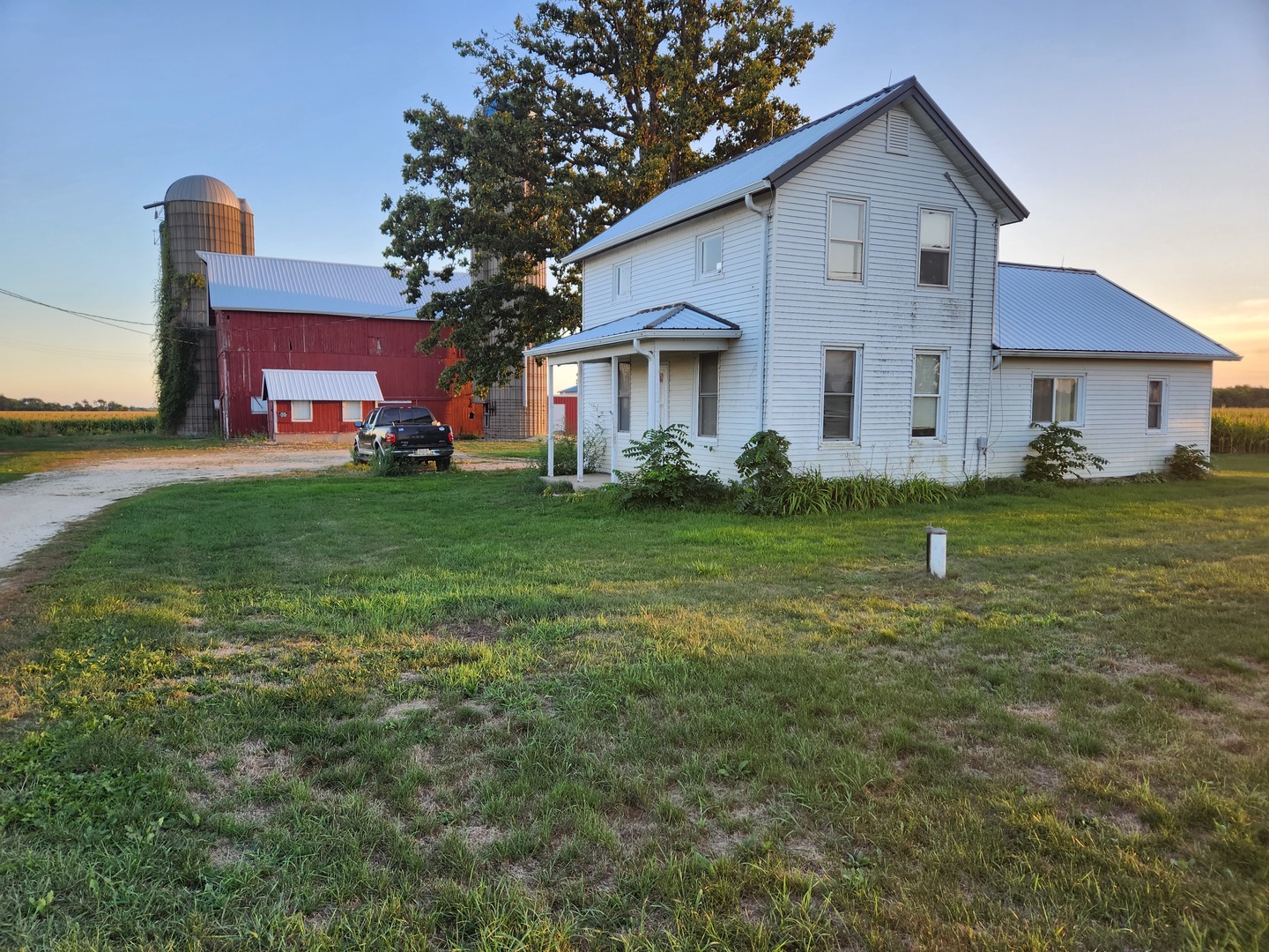 23909 Lawrence Road Harvard, IL 60033 - Photo 2 of 21 a view of a yard in front of a house