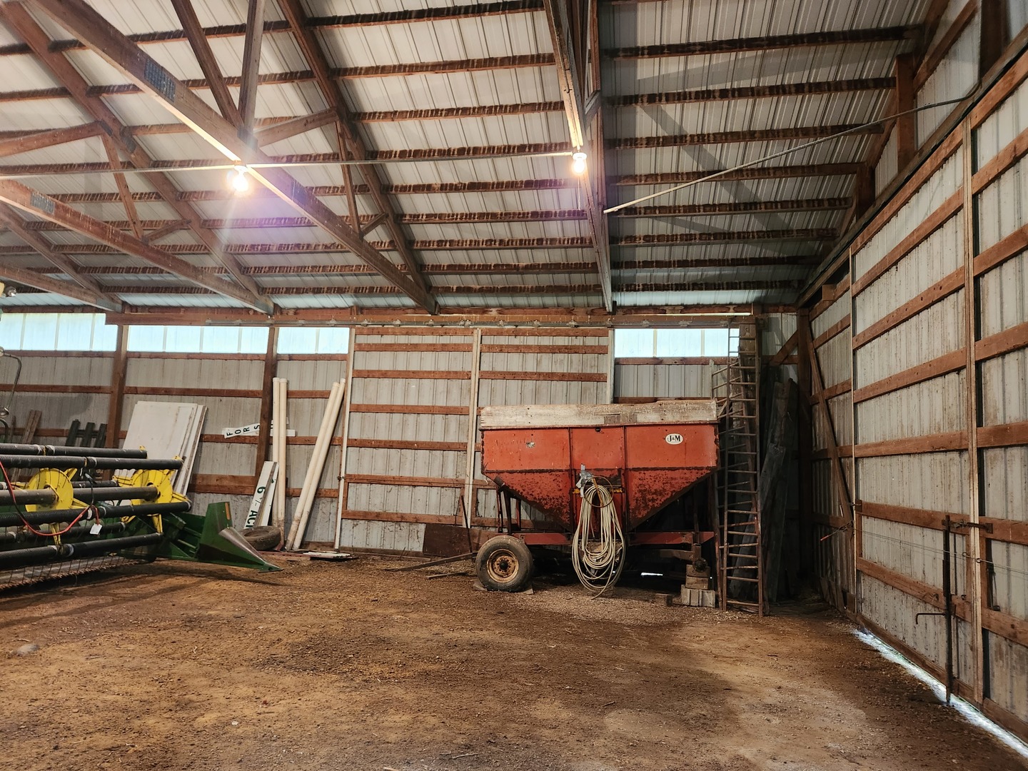 23909 Lawrence Road Harvard, IL 60033 - Photo 10 of 21 a view of a garage with parked cars