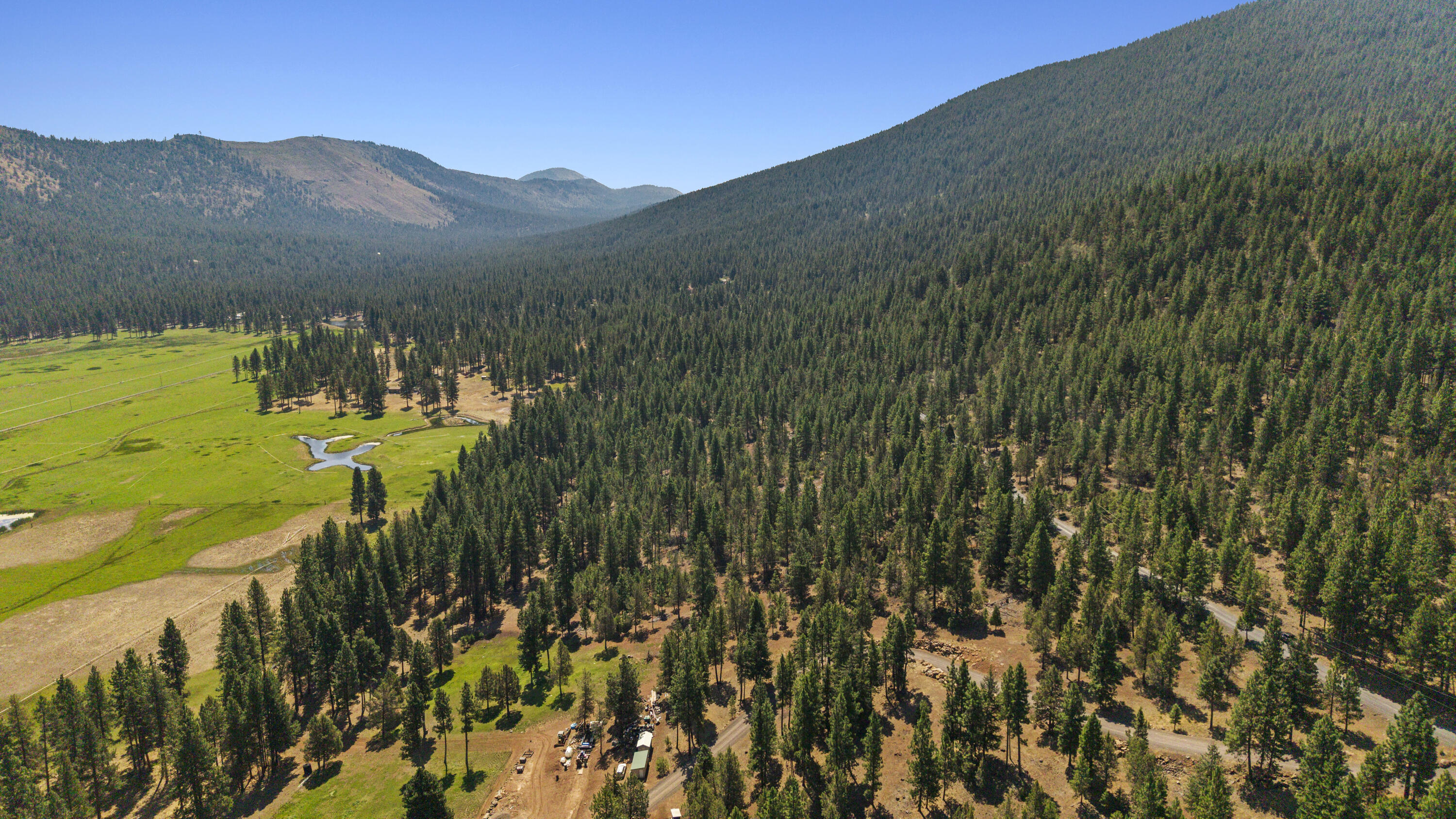 0 Simpson Canyon Road, Unit 15 Klamath Falls, OR 97601 - Photo 24 of 37 a view of a town with mountains in the background
