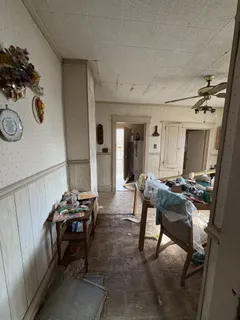 a bed room with furniture and a window