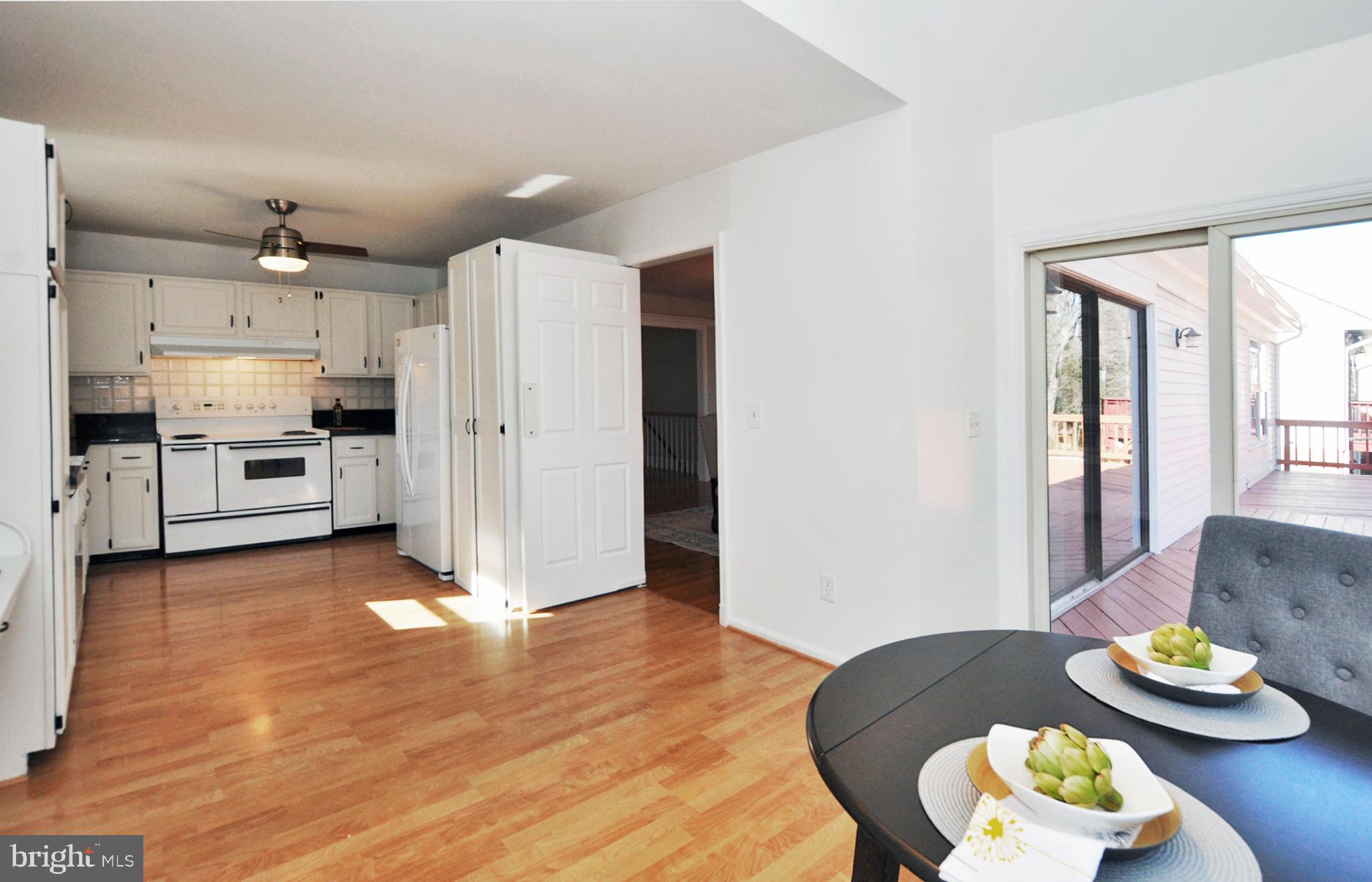 5003 Sangamore Road Bethesda, MD 20816 - Photo 13 of 33 Kitchen has door to Deck