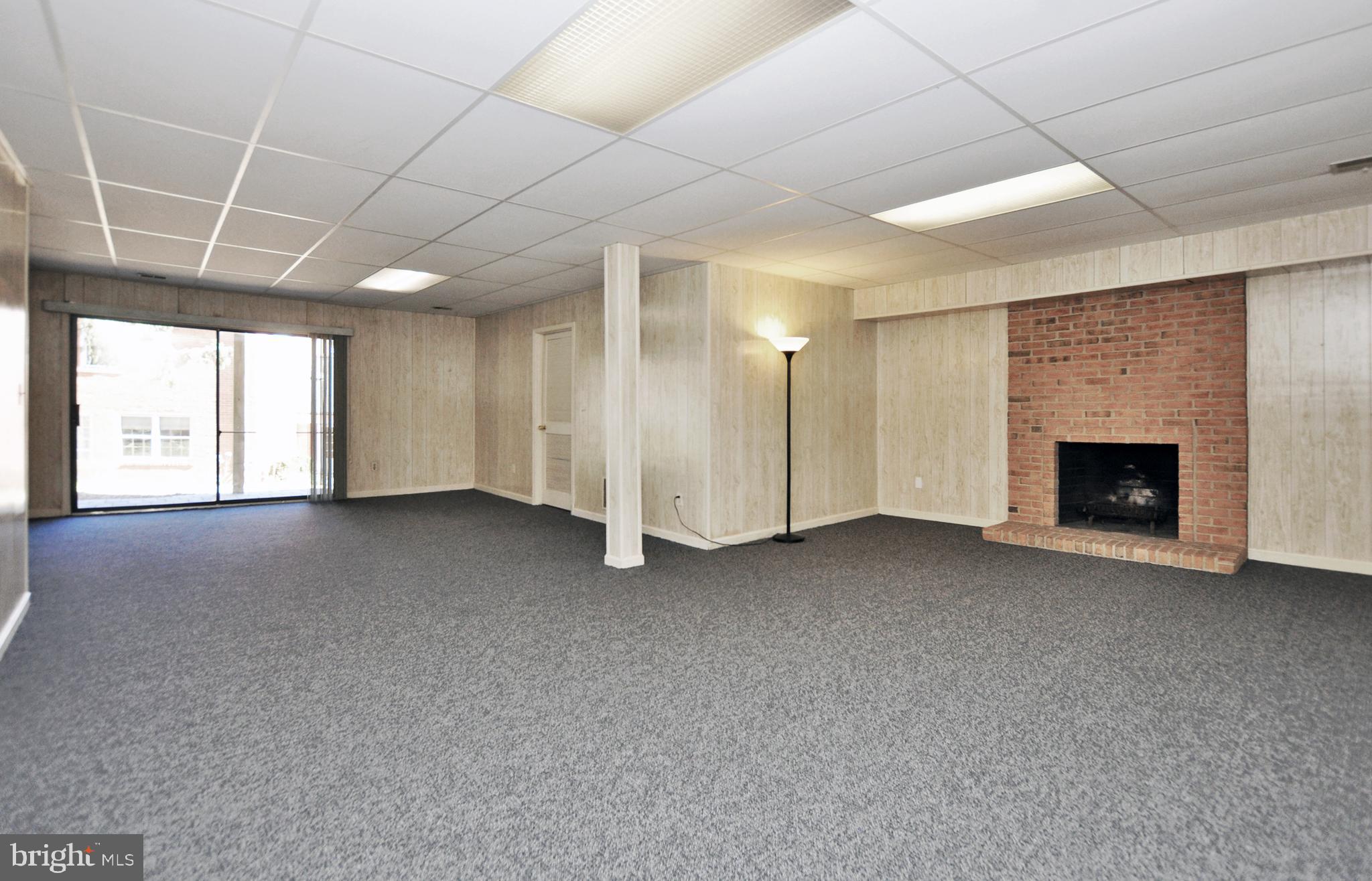 5003 Sangamore Road Bethesda, MD 20816 - Photo 23 of 33 Huge Rec room with Fireplace