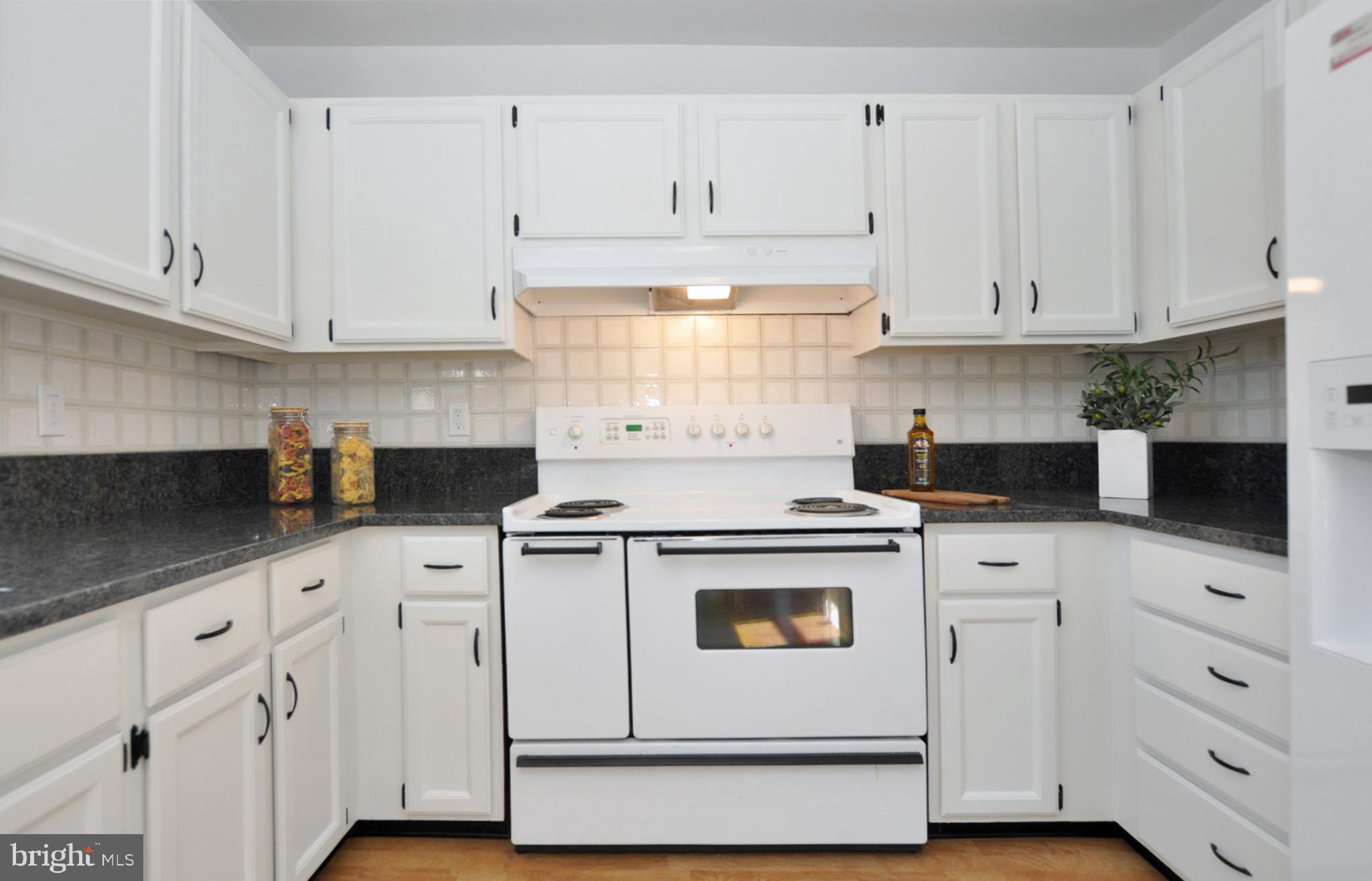 5003 Sangamore Road Bethesda, MD 20816 - Photo 10 of 33 Kitchen with new granite counters