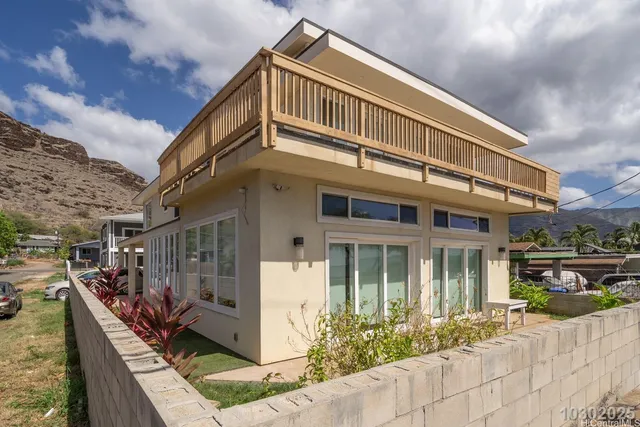 a front view of a building with street view
