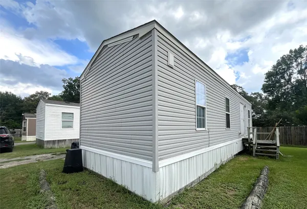 a view of backyard with deck