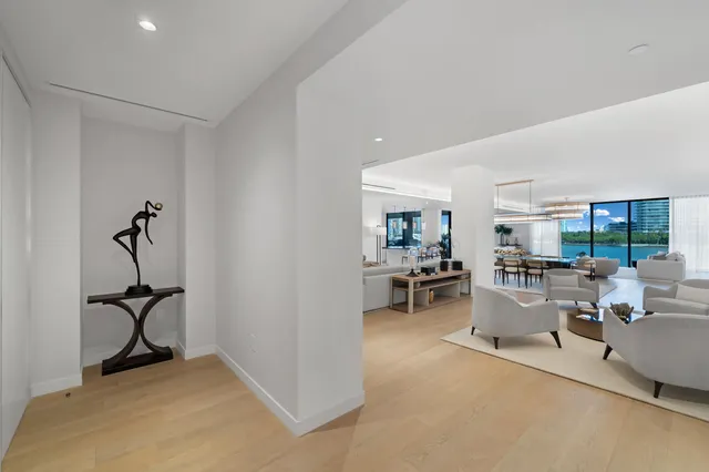 a view of a livingroom with furniture and a window