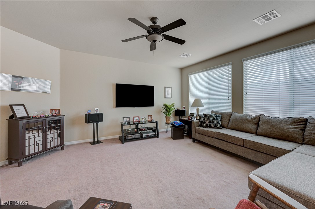 6970 Motley Road Las Vegas, NV 89178 - Photo 15 of 52 Spacious Great Room/Living Room with ceiling fan