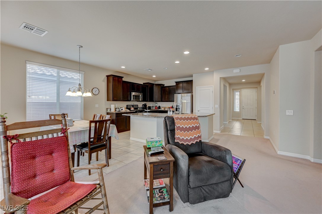 6970 Motley Road Las Vegas, NV 89178 - Photo 16 of 52 Spacious Great Room/Living Room with view of fabulous Kitchen