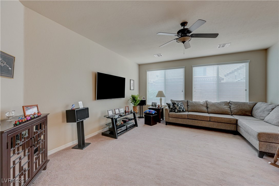 6970 Motley Road Las Vegas, NV 89178 - Photo 21 of 52 Spacious Great Room/Living Room with ceiling fan