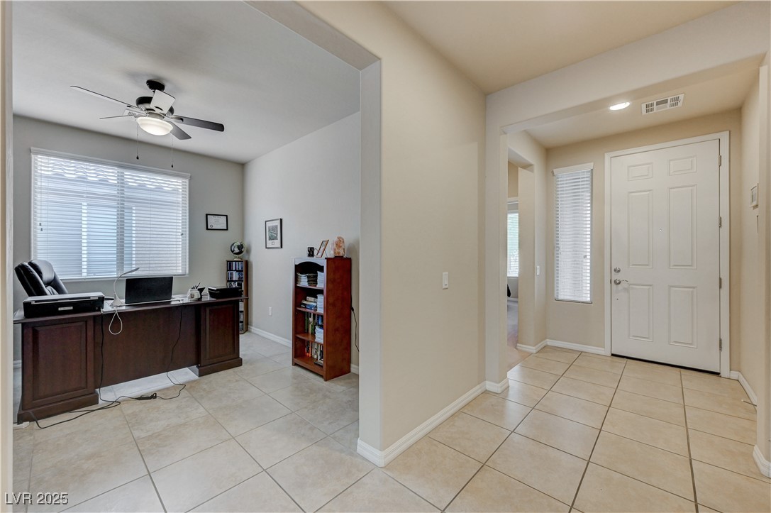 6970 Motley Road Las Vegas, NV 89178 - Photo 35 of 52 Entrance foyer with ceramic tile flooring plus Den/Office with ceiling fan