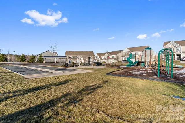 a view of a chairs and table in the patio