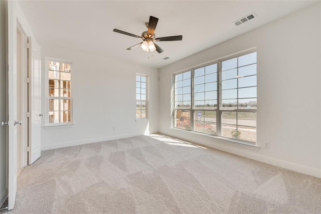 12711 Pne Rdg Trail Wylie, TX 75098 - Photo 12 of 30 a view of an empty room with a window